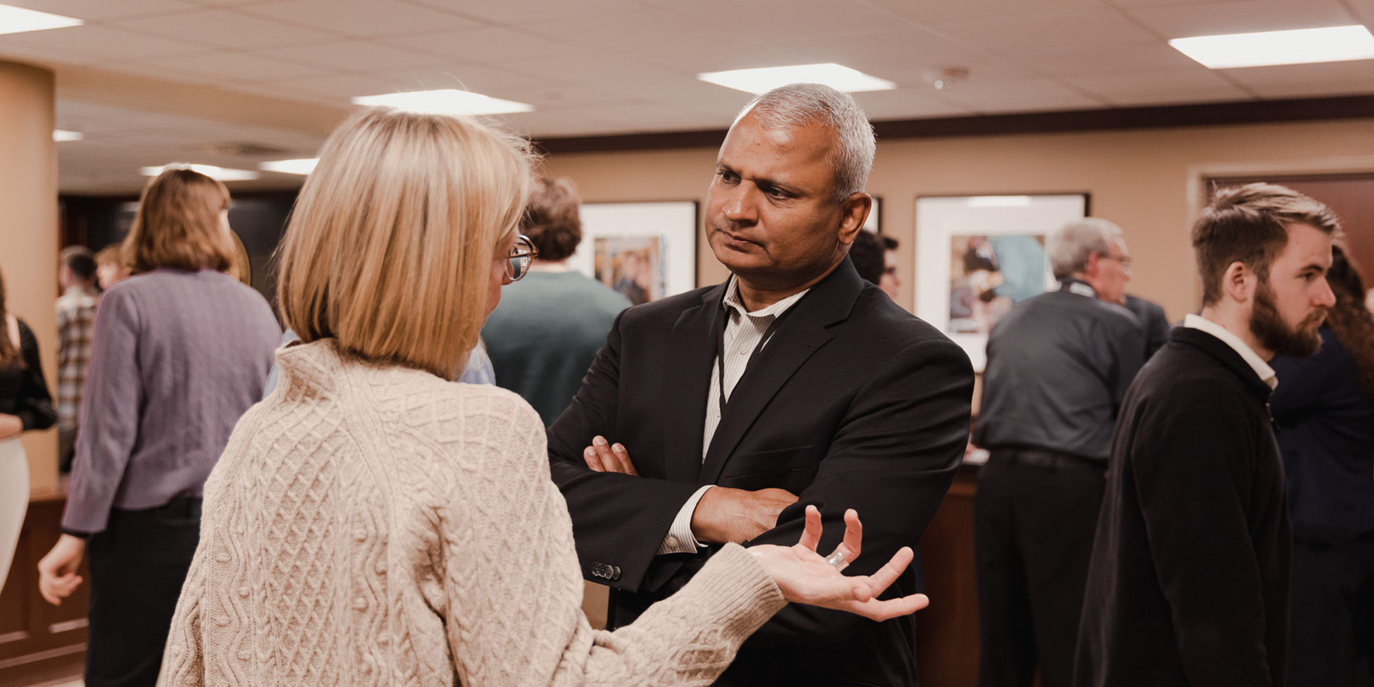 Attendees in conversation at the Symposium on Transforming Culture