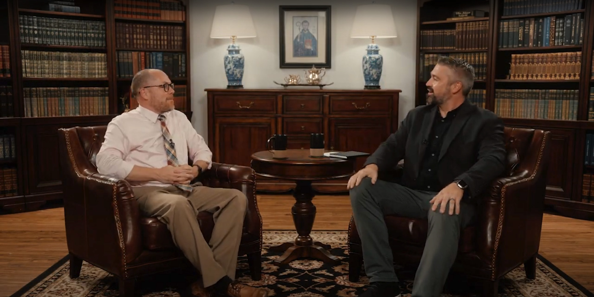 Tim Carney and Dr. Jared Zimmerer having a conversation during an episode of The Benedictine Dialogues